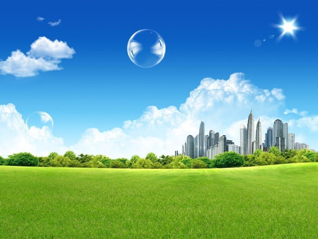 Green hill with bubbles in the sky and skyscrapers in the background